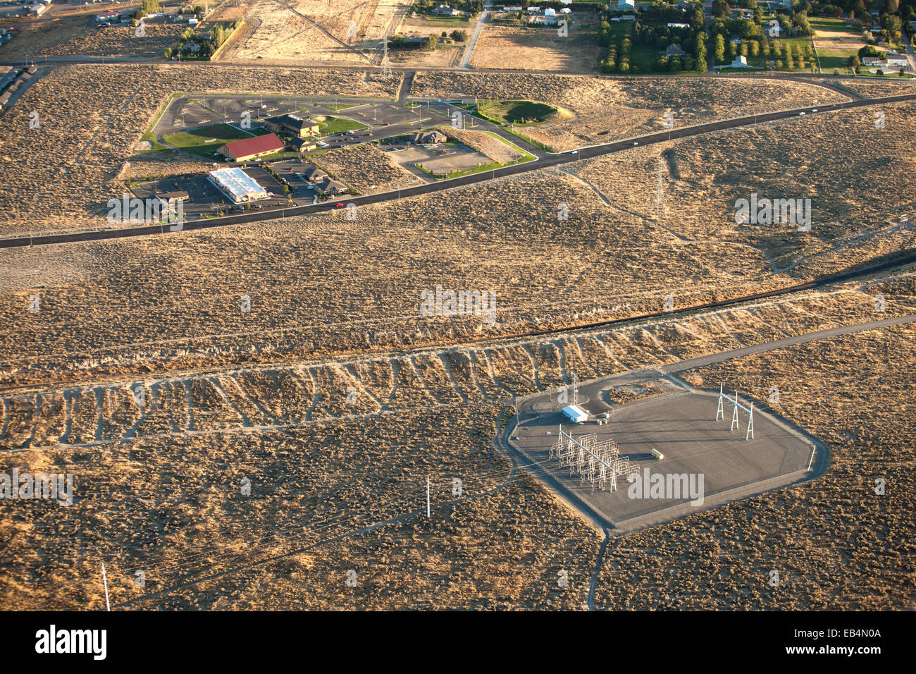 Electrical distribution and power lines in an arid landscape near urban ...