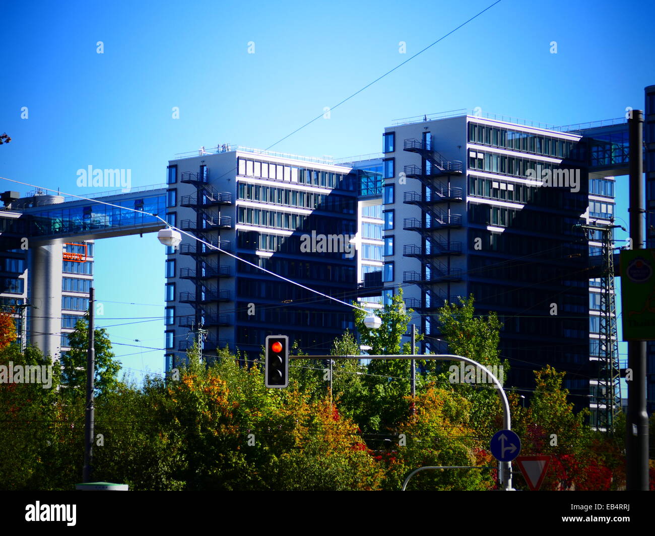Modern Office glass facade building in blue sky Stock Photo - Alamy