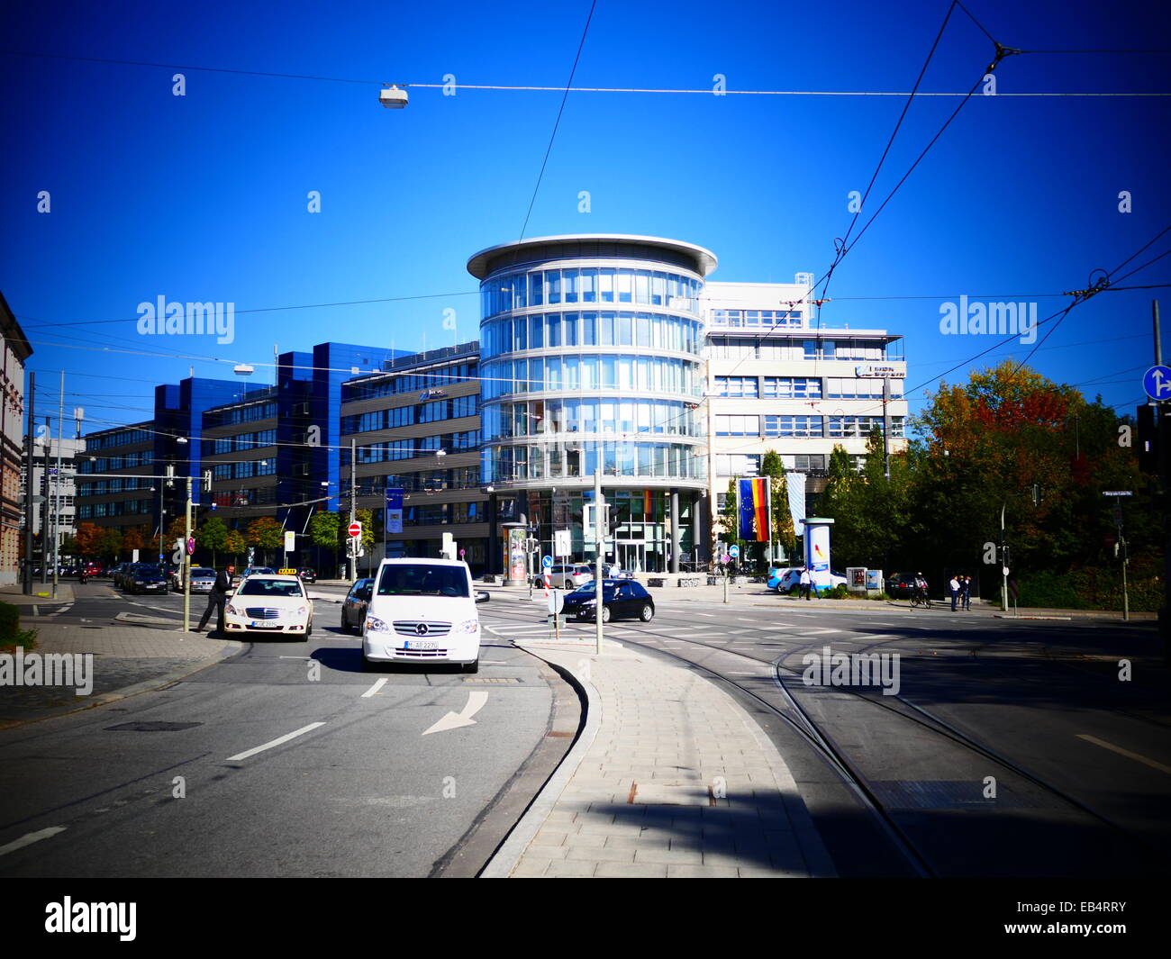 Modern Office glass facade building in blue sky Stock Photo - Alamy