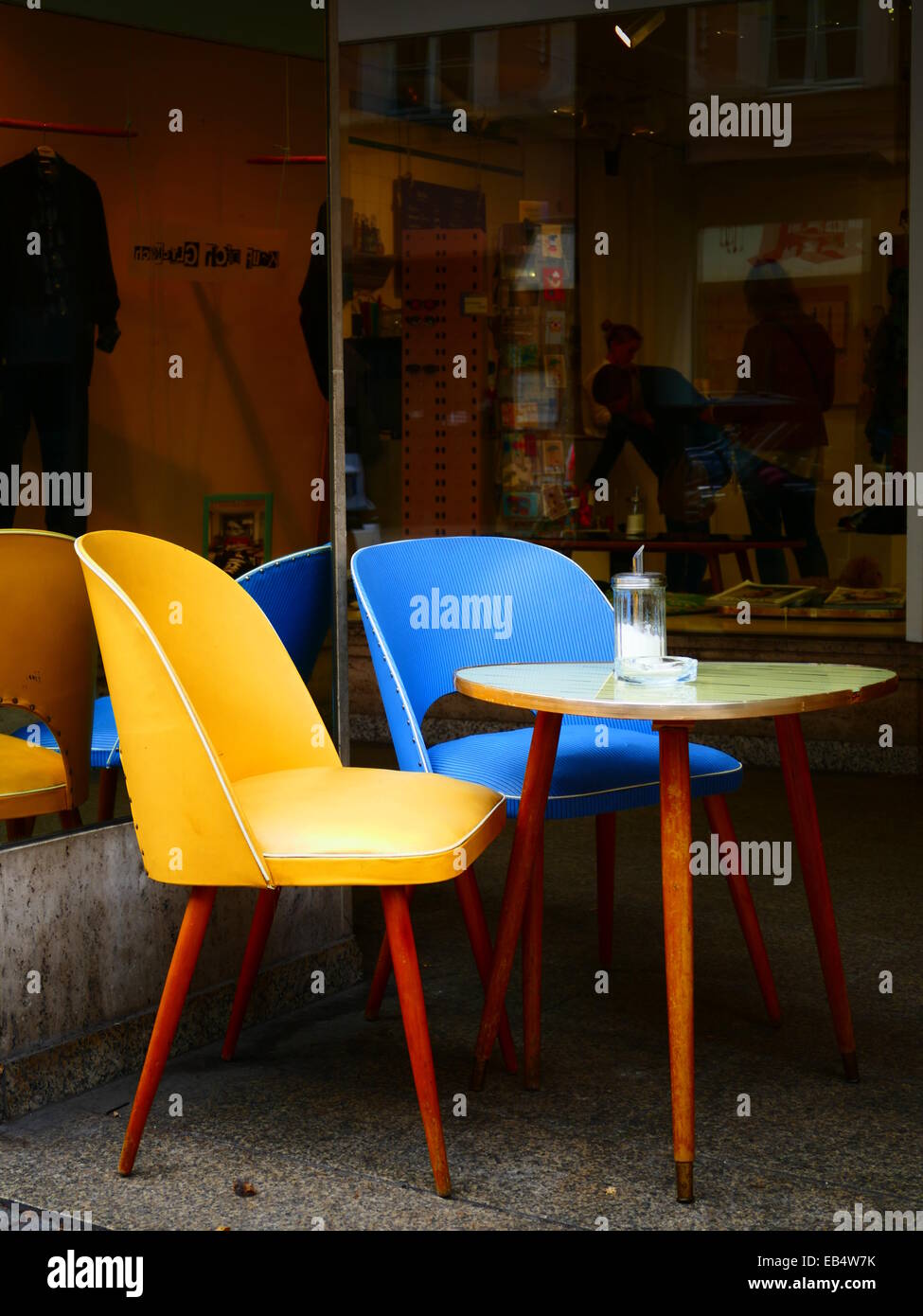 Nostalgia Nostalgic Table and Chair at sidewalk coffee shop Stock Photo