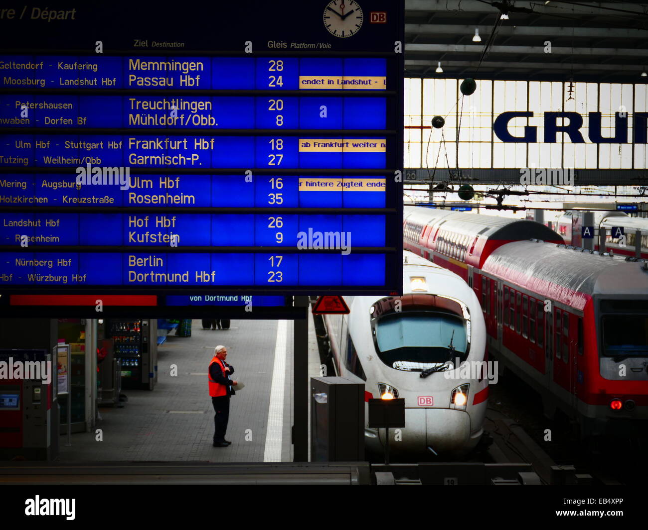 Germany Munich German Station Table and train on platform Photo - Alamy