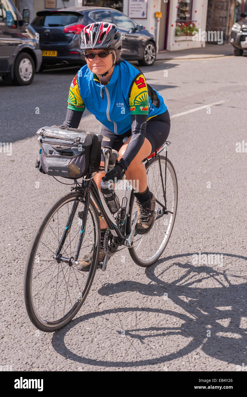 Women cycling at Hawes , Wensleydale ,  in the Yorkshire Dales in Yorkshire , England , Britain , Uk Stock Photo