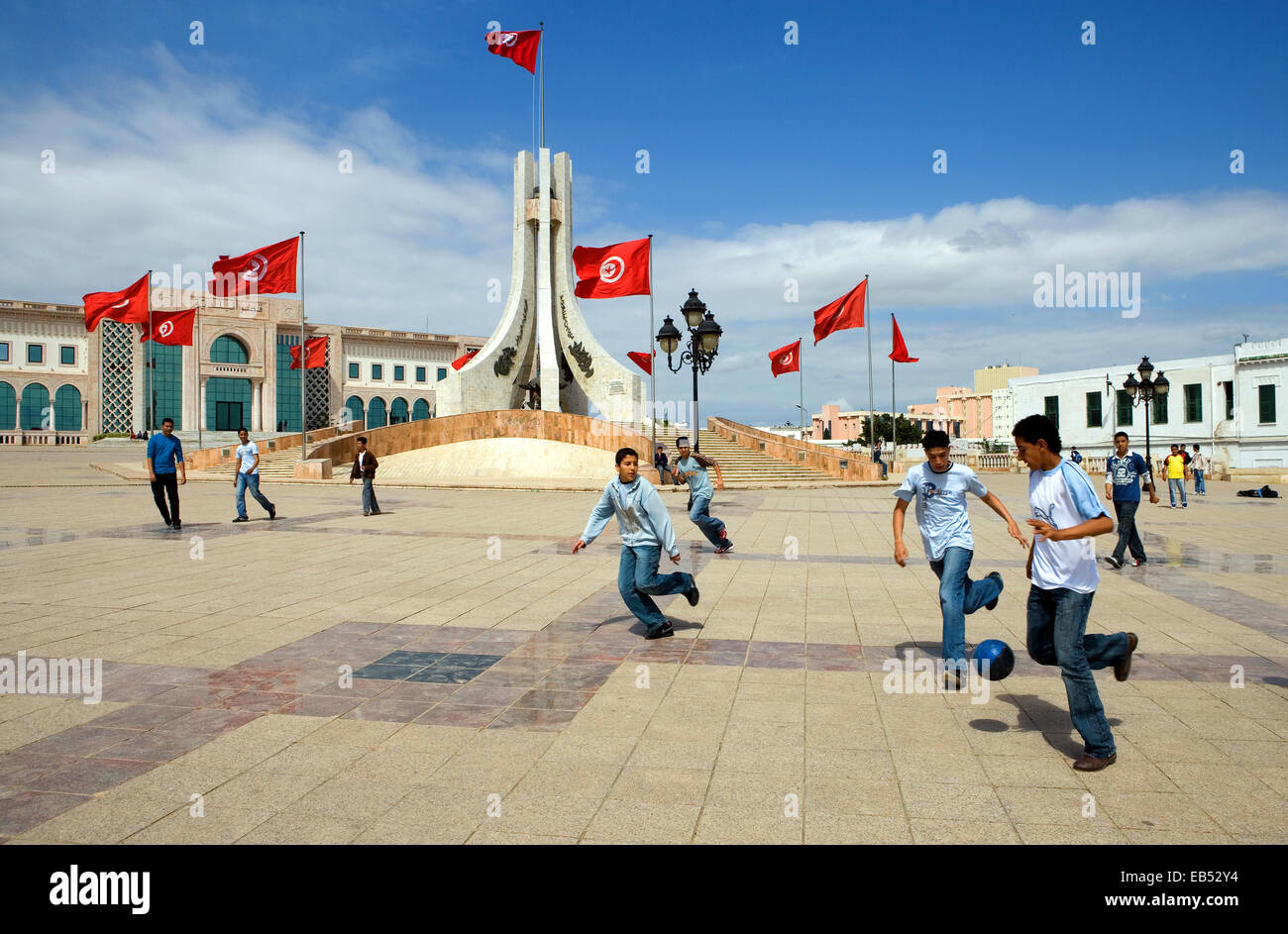 Tunisia, Tunis, boys playing football in the Town Hall square Stock Photo