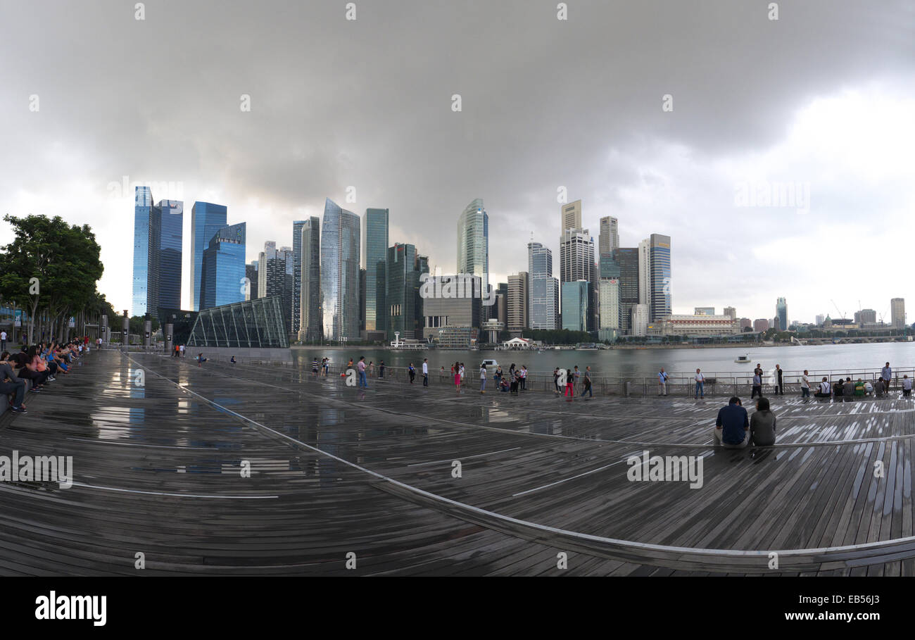 South East Asia Dramatic Singapore Skyline Metropolis Marina Bay in cloudy sky Stock Photo