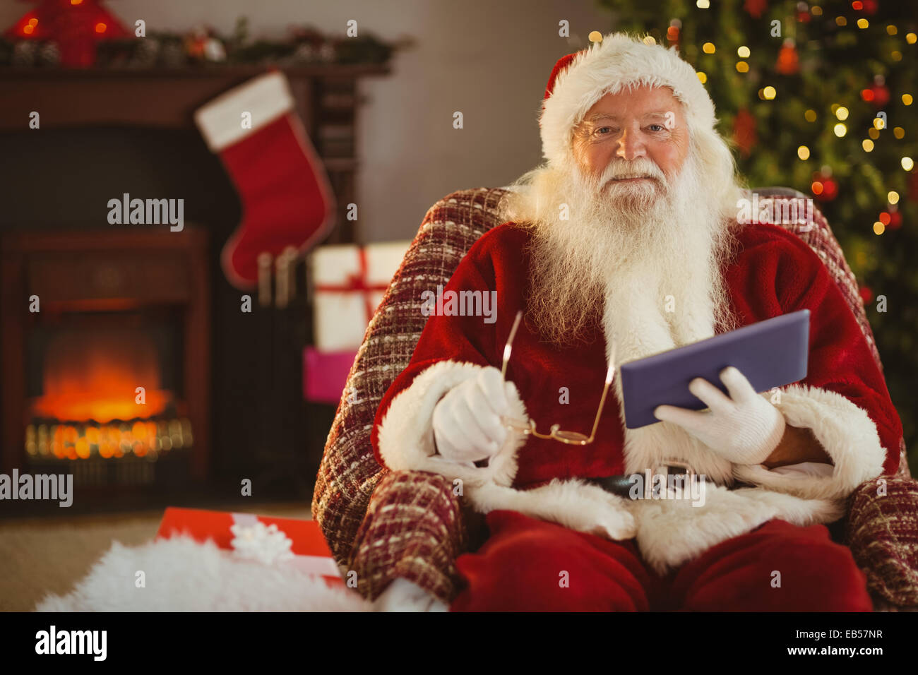 Smiling father holding tablet hi-res stock photography and images - Alamy
