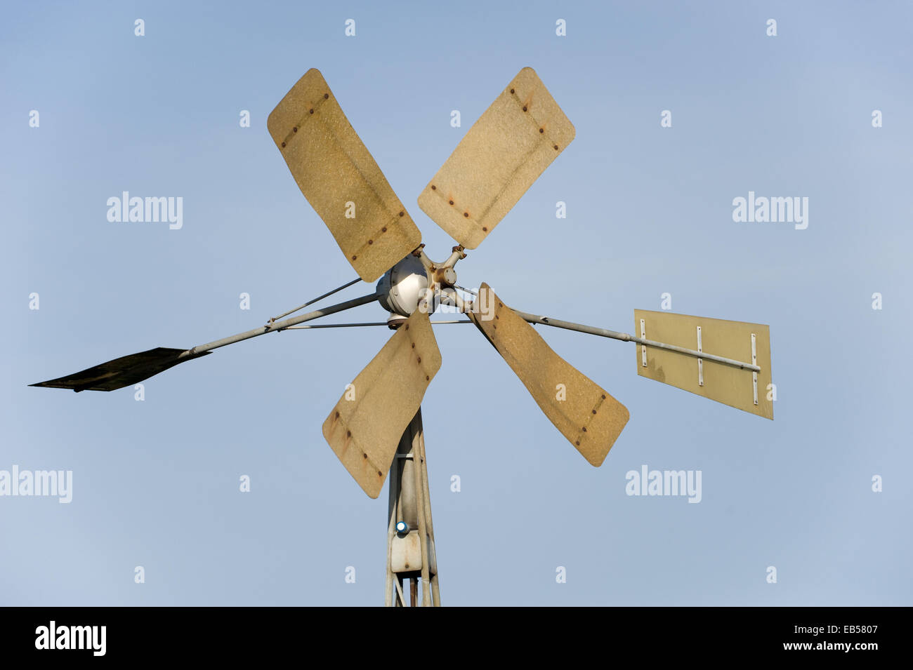 Wind turbine against a clear blue sky Stock Photo - Alamy