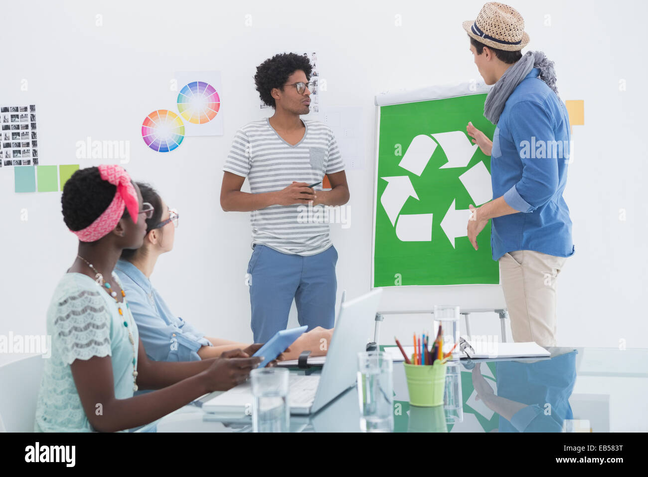 Young creative team having a meeting about recycling Stock Photo