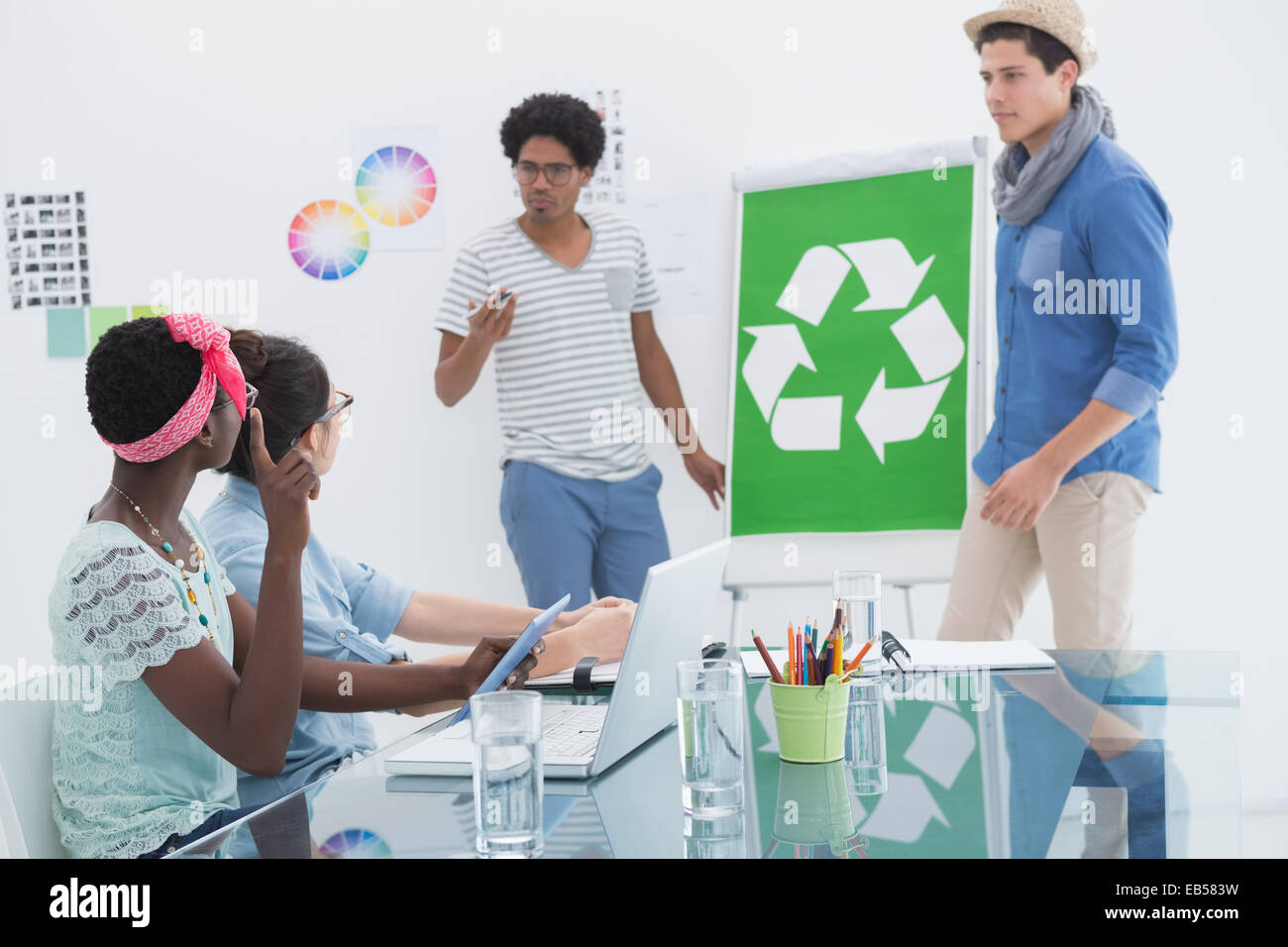 Young creative team having a meeting about recycling Stock Photo