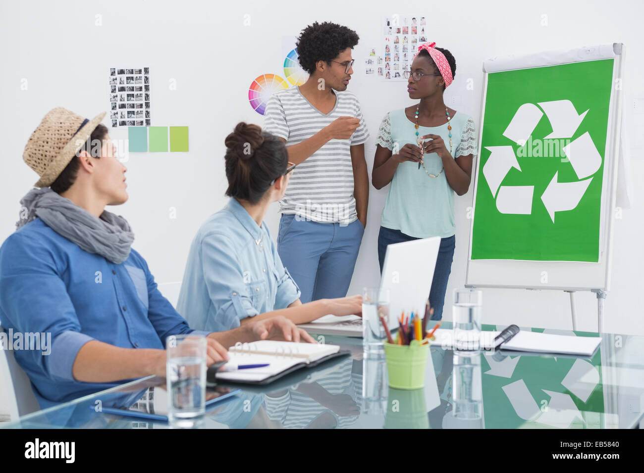 Young creative team having a meeting about recycling Stock Photo