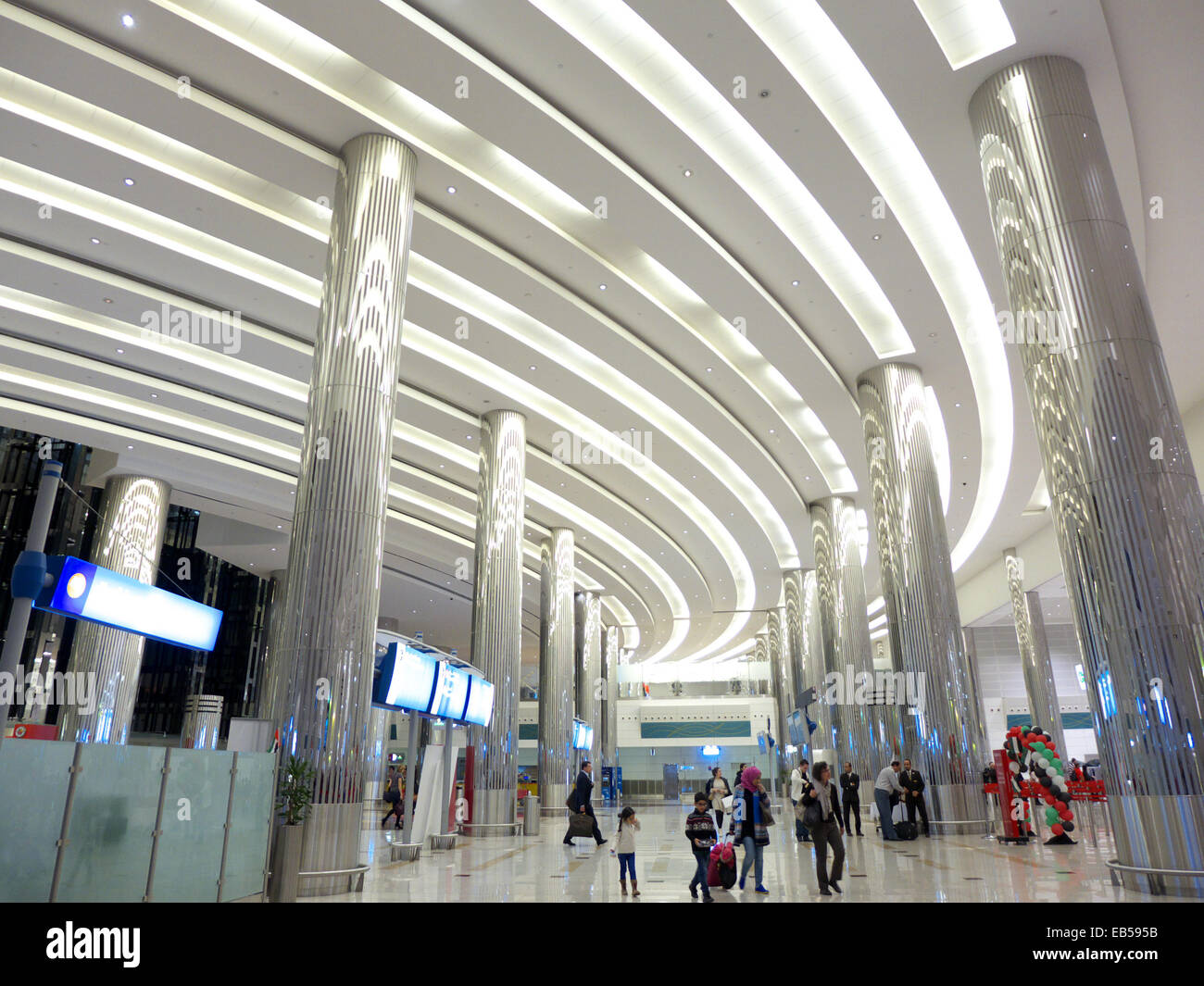UAE Dubai International Airport architecture modern arrival departure passengers traveller traffic tourism tourist holiday Stock Photo