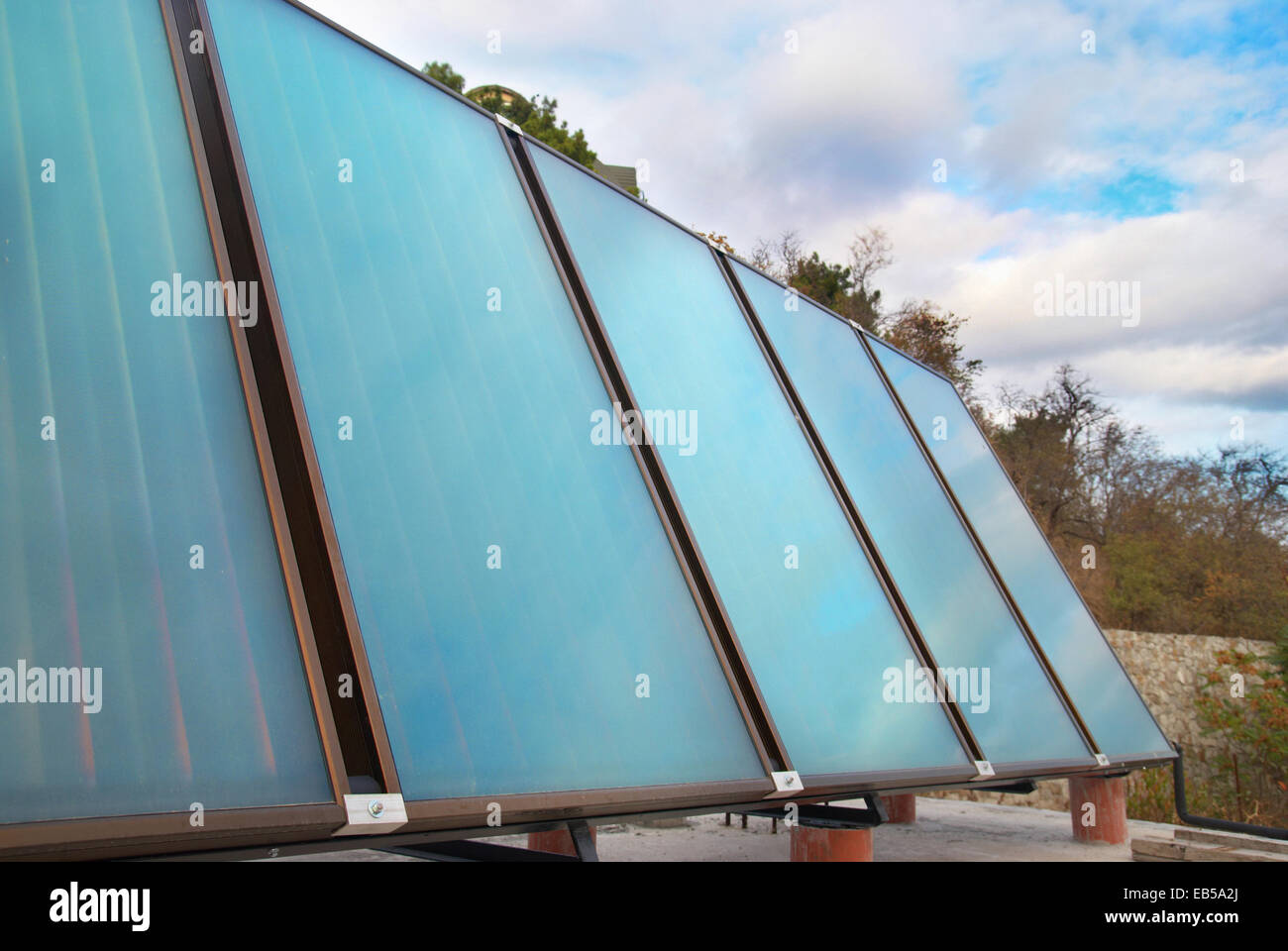 Solar water heating system on the house roof Stock Photo - Alamy