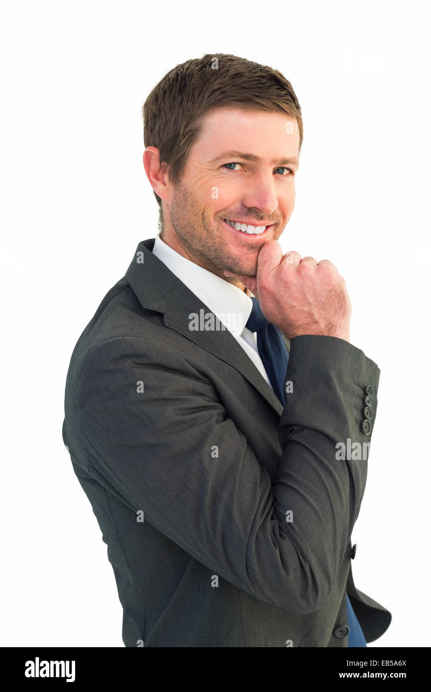 Handsome businessman smiling at camera Stock Photo - Alamy
