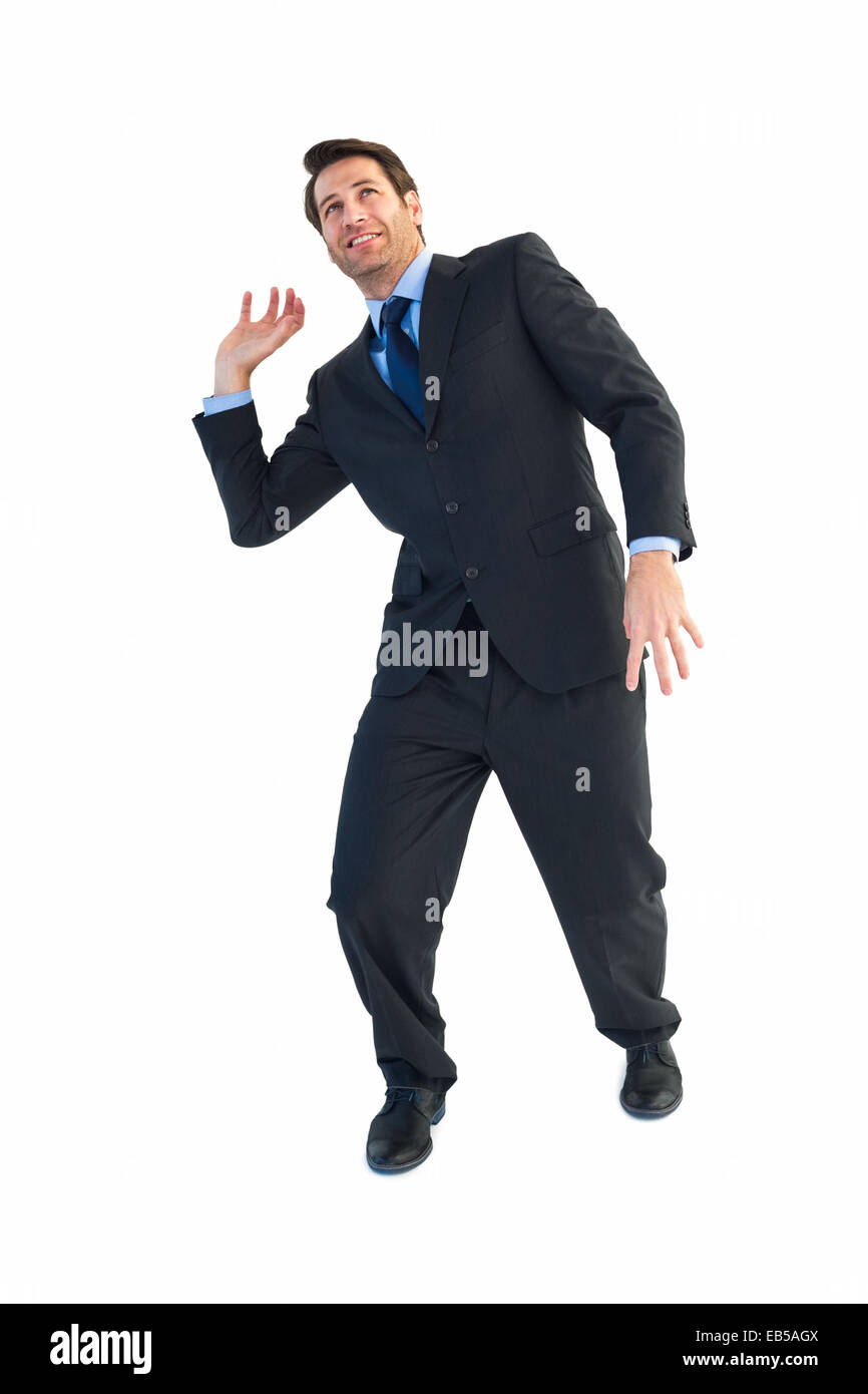 Businessman Carrying Something Heavy With His Hands Stock Photo Alamy