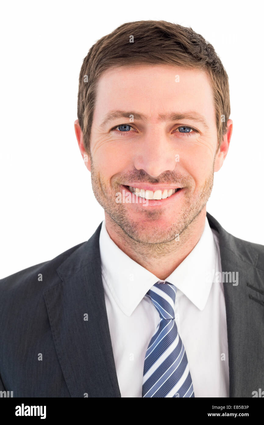 Businessman smiling at the camera Stock Photo - Alamy