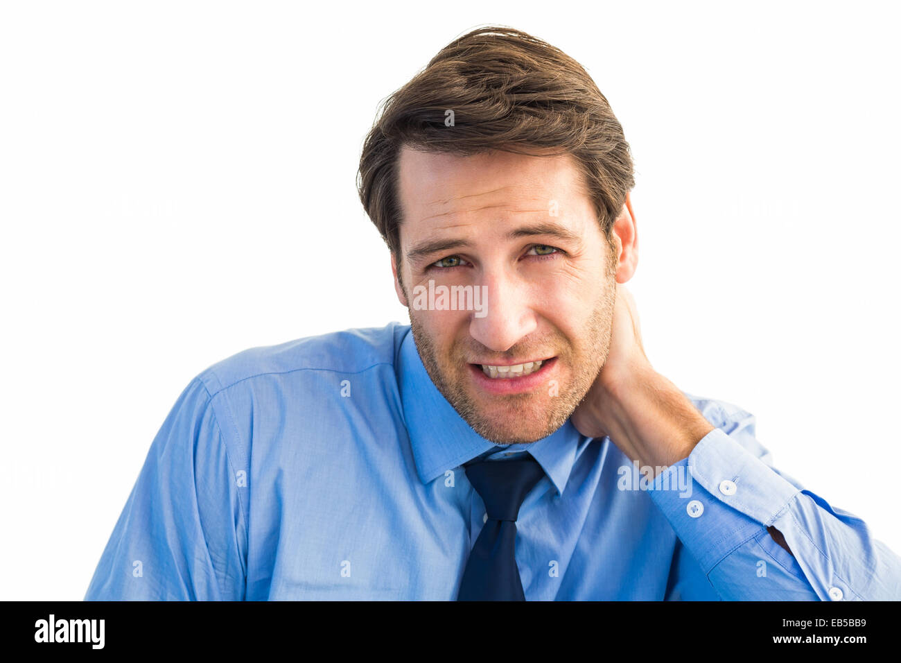 Businessman having a sore neck Stock Photo Alamy