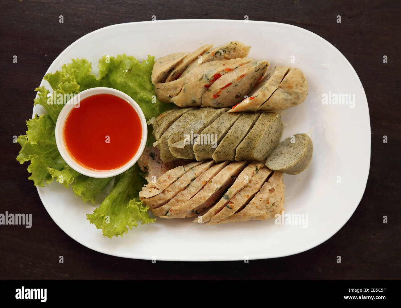 ''Mooyor'' or Vietnamese sausage pork with sauce on a plate Stock Photo