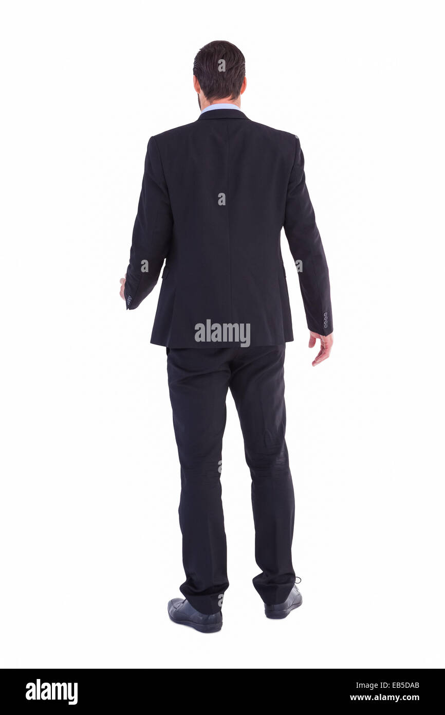 Rear view of businessman standing Stock Photo - Alamy