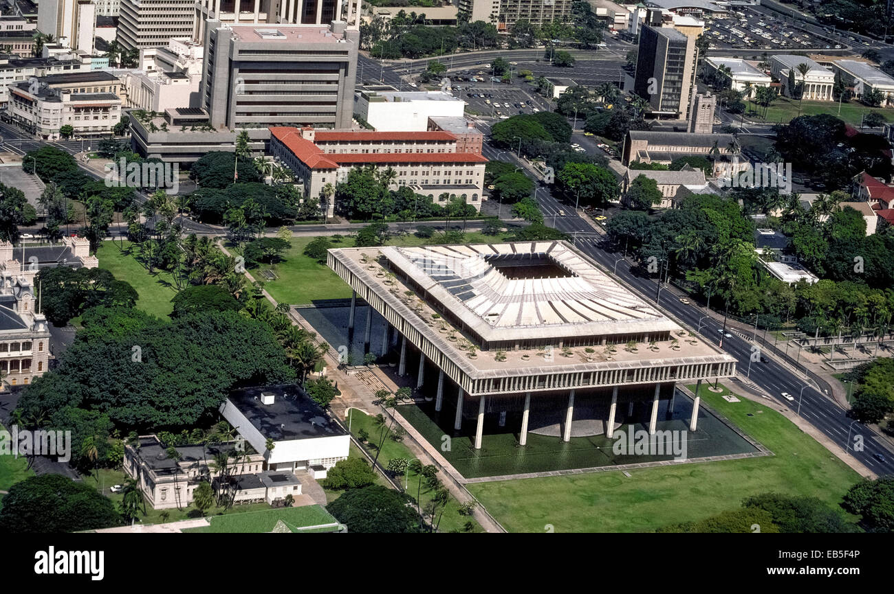 An aerial view of the unique Hawaii State Capitol building in downtown Honolulu, Hawaii, USA, shows its sloping inner roof that resembles a volcano. Stock Photo