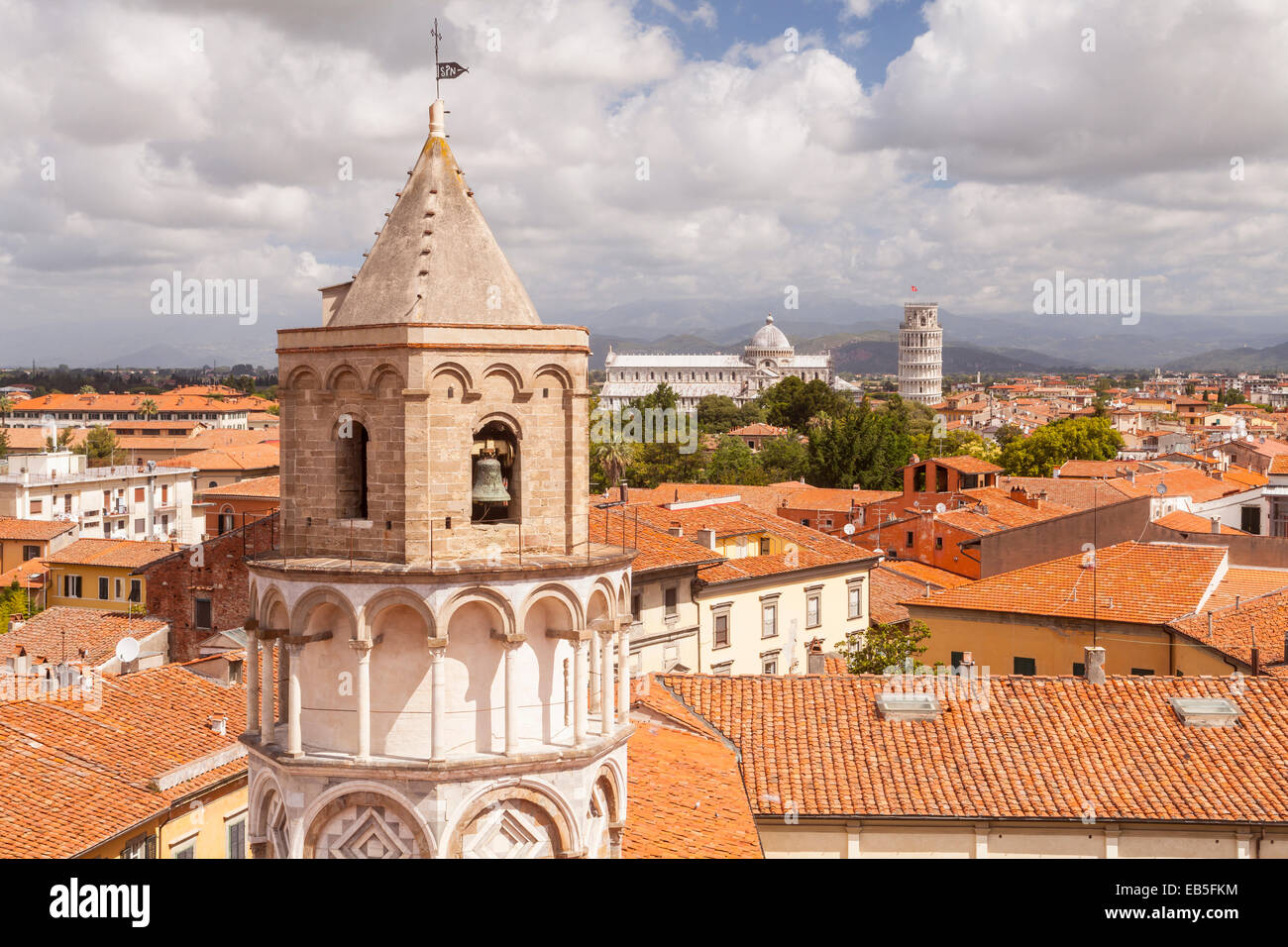 The rooftops of Pisa in Italy. The famous leaning tower and the Duomo di Pisa can be seen in the distance. Stock Photo