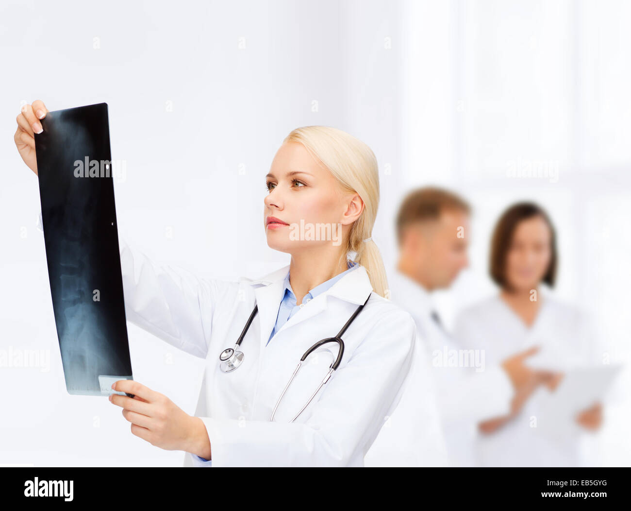 Female doctor studying spine hi-res stock photography and images - Alamy