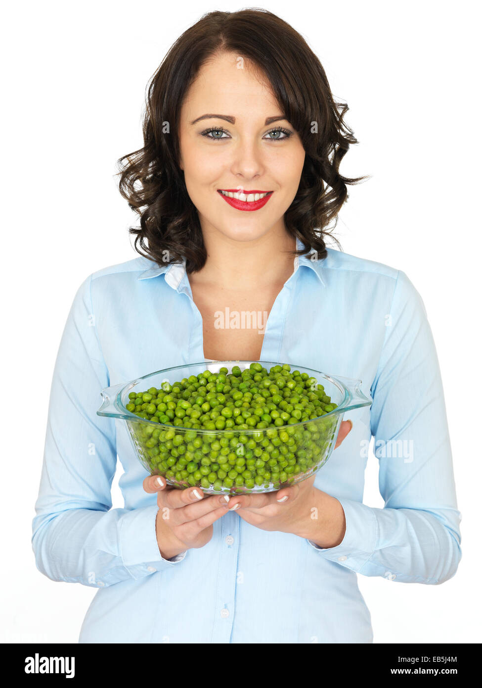 Attractive Young Woman Holding a Bowl of Cooked Peas Stock Photo