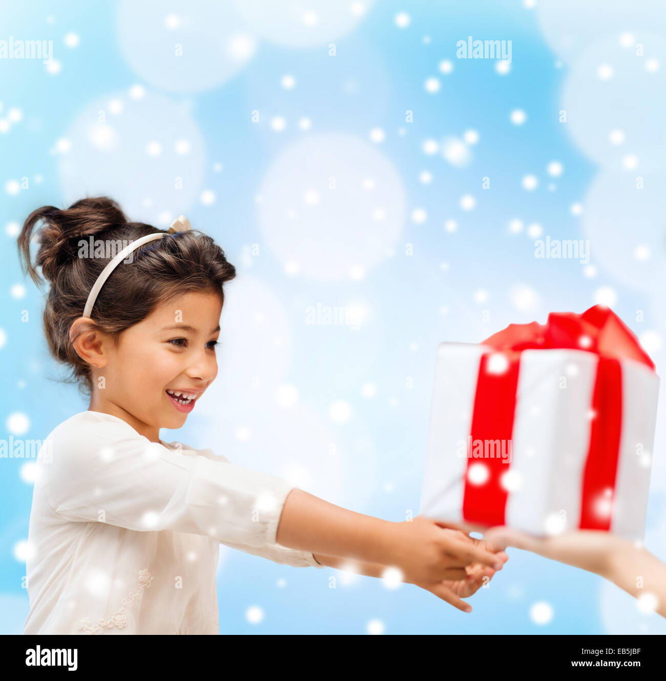 smiling little girl with gift box Stock Photo - Alamy
