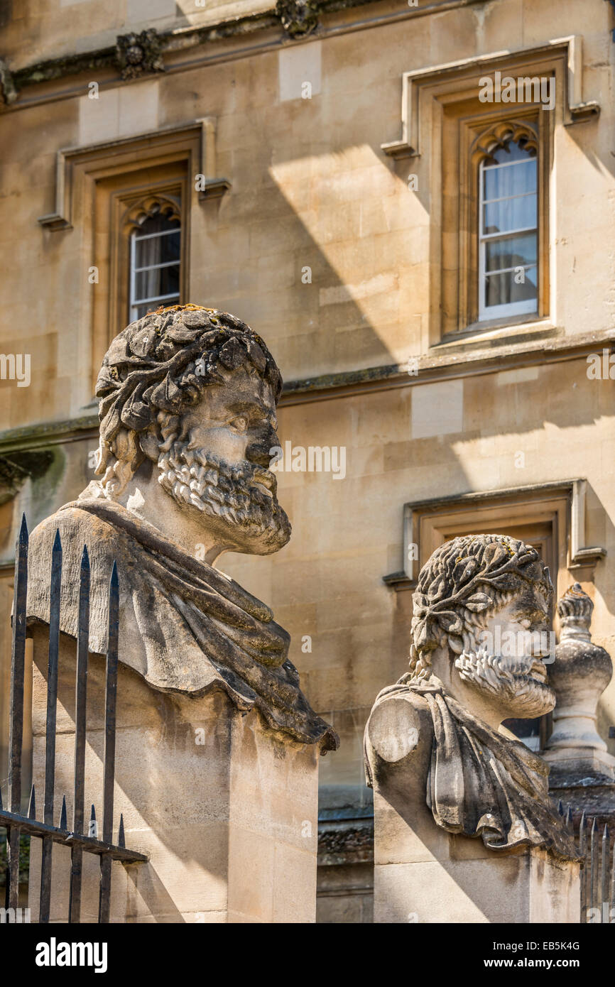 Grotesque decorative stone figure heads outside the Sheldonian Theatre, Oxford University Stock Photo