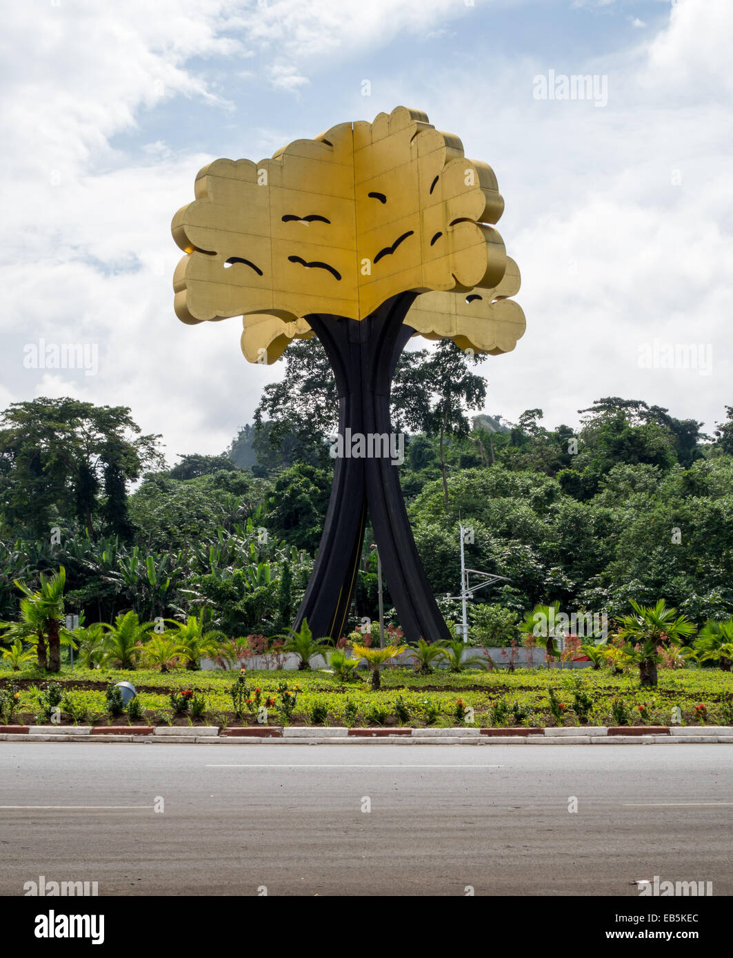Large metal sculpture of Ceiba tree on a roundabout in the capital city of Malabo, Equatorial Guinea, Africa Stock Photo