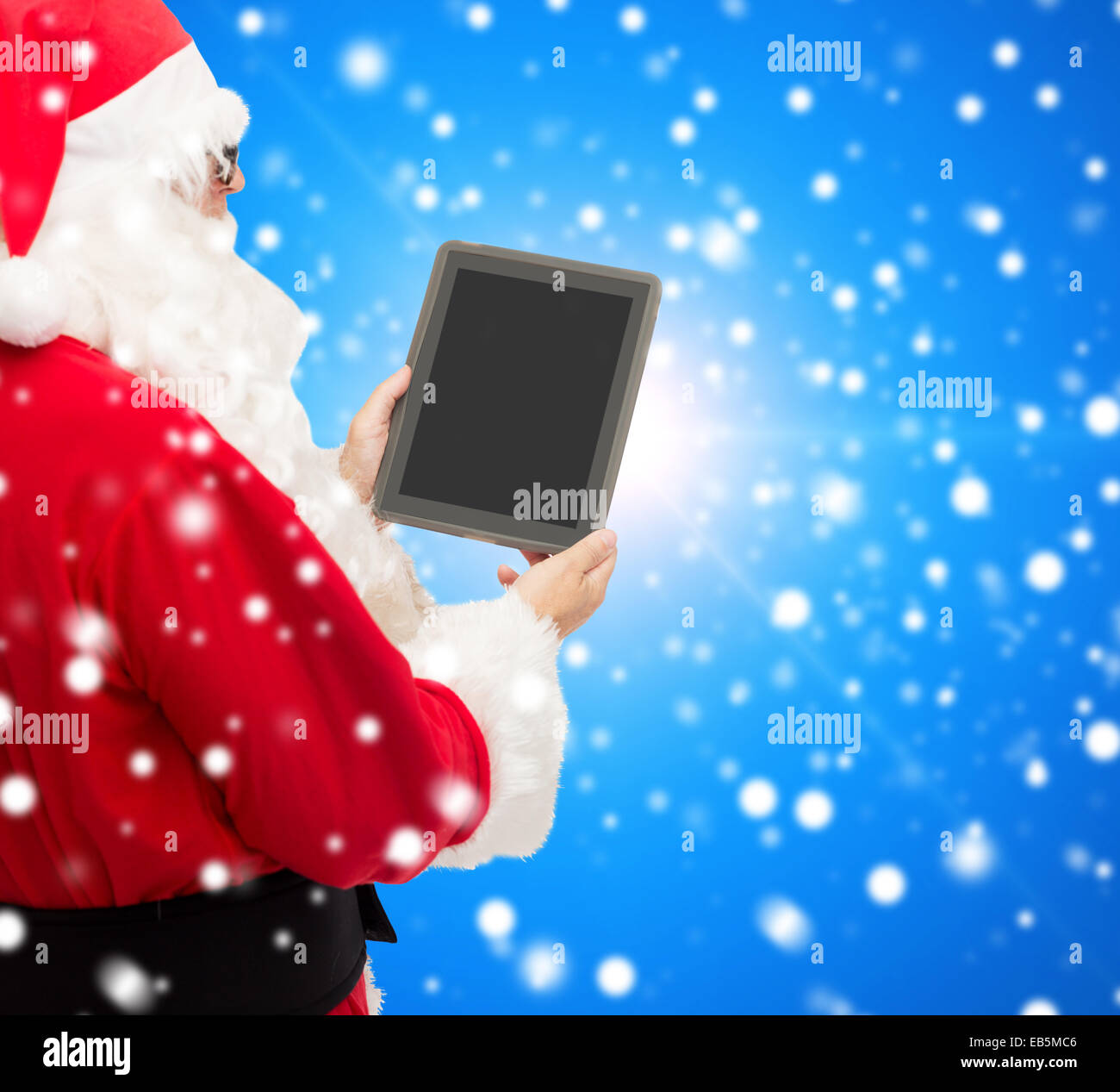 man in costume of santa claus with tablet pc Stock Photo - Alamy