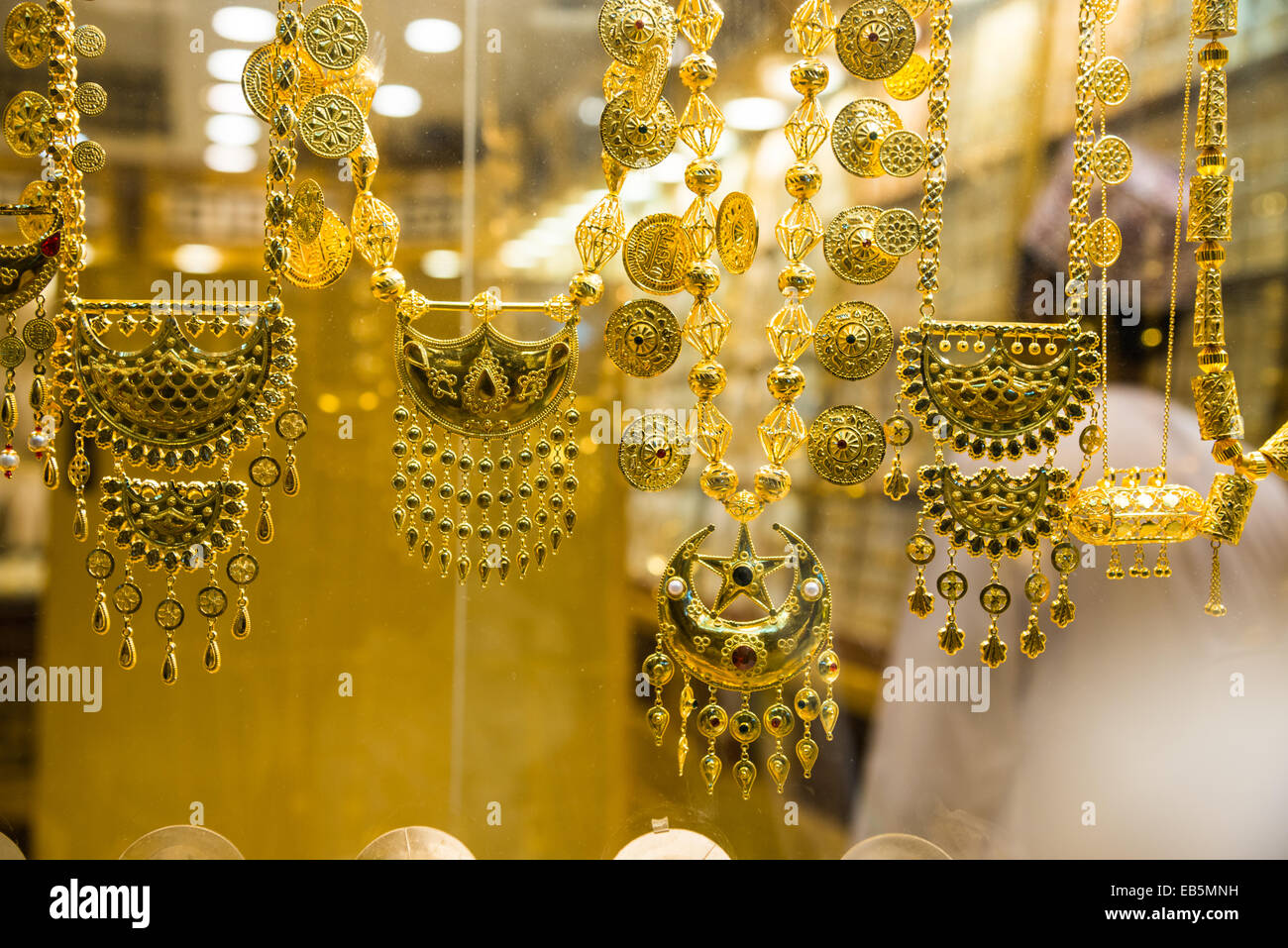 Gold jewelries displayed in a store. Souq Muttrah, Muscat, Oman Stock ...