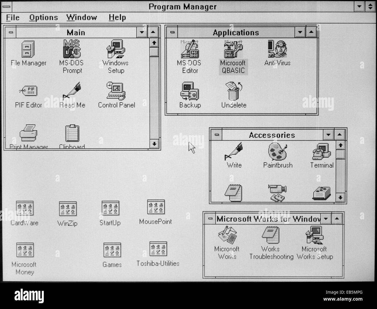 Screen of a 1995 monochrome Toshiba T2100 laptop computer displaying Microsoft Windows 3.11 Stock Photo
