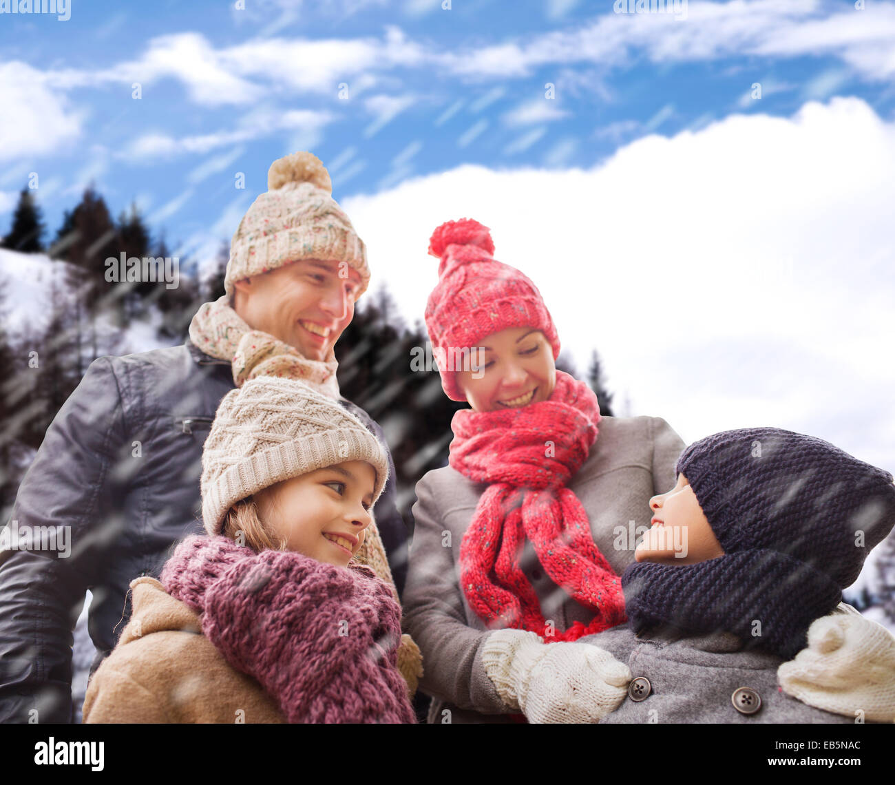 happy family in winter clothes outdoors Stock Photo - Alamy