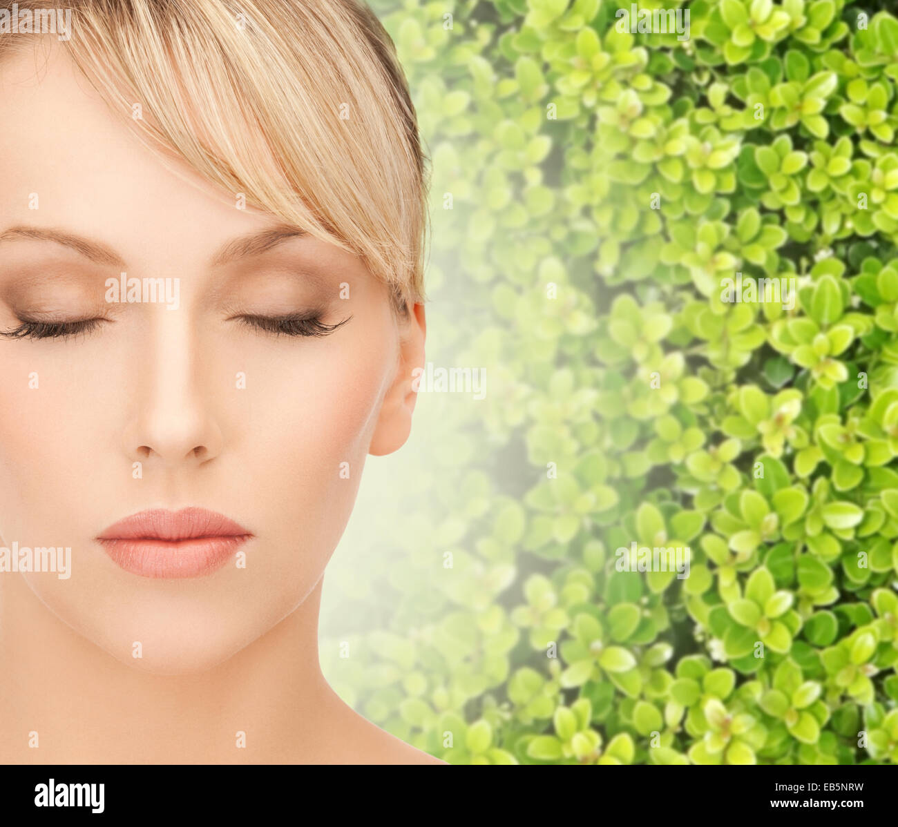 beautiful young woman touching her face skin Stock Photo - Alamy
