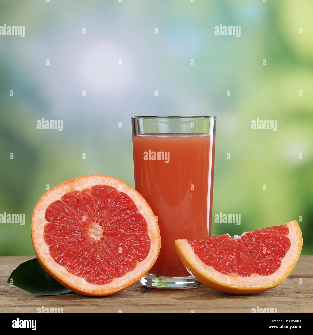 Healthy grapefruit juice and fresh grapefruits fruits in summer Stock Photo