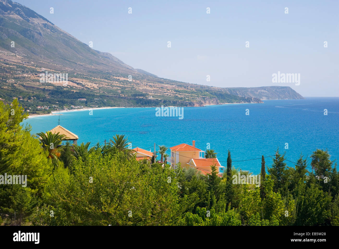 Lourdata, Kefalonia, Ionian Islands, Greece. View across the turquoise waters of Lourdata Bay, Lourdas Beach prominent. Stock Photo