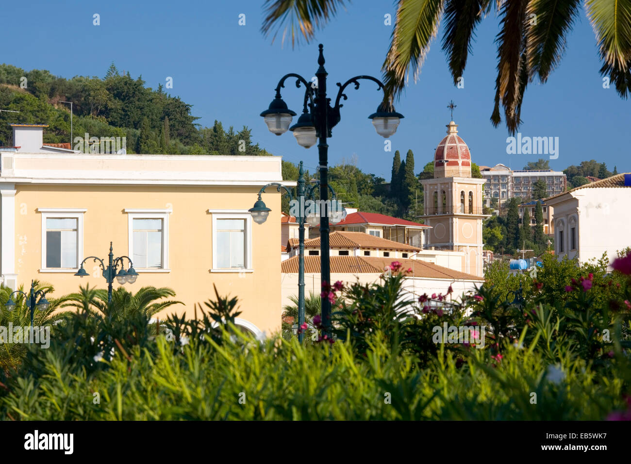 Zakynthos Town, Zakynthos, Ionian Islands, Greece. A verdant corner of the town, church bell-tower prominent. Stock Photo