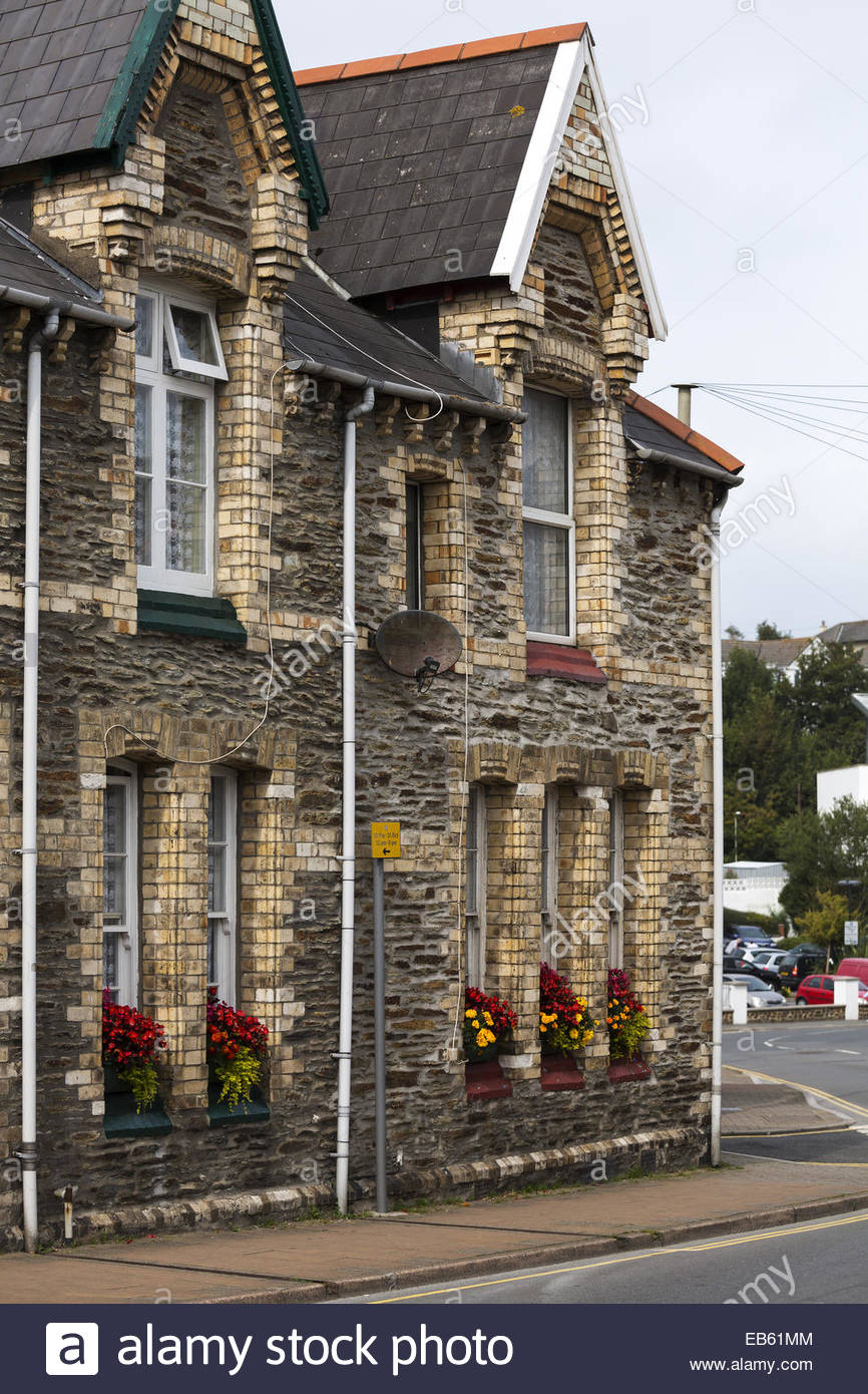 Brick and stone terraced houses with no front garden, Ilfracombe, Devon Stock Photo