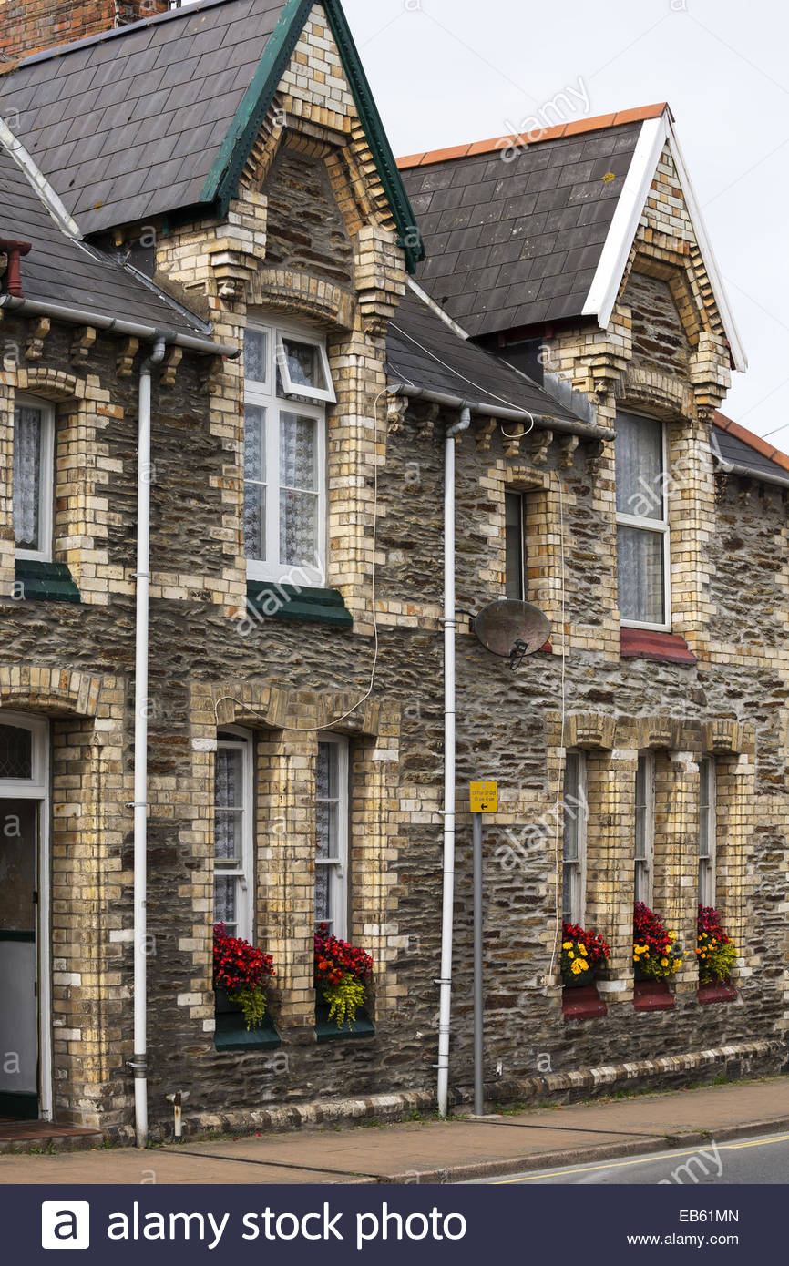 Brick and stone terraced houses with no front garden, Ilfracombe, Devon Stock Photo