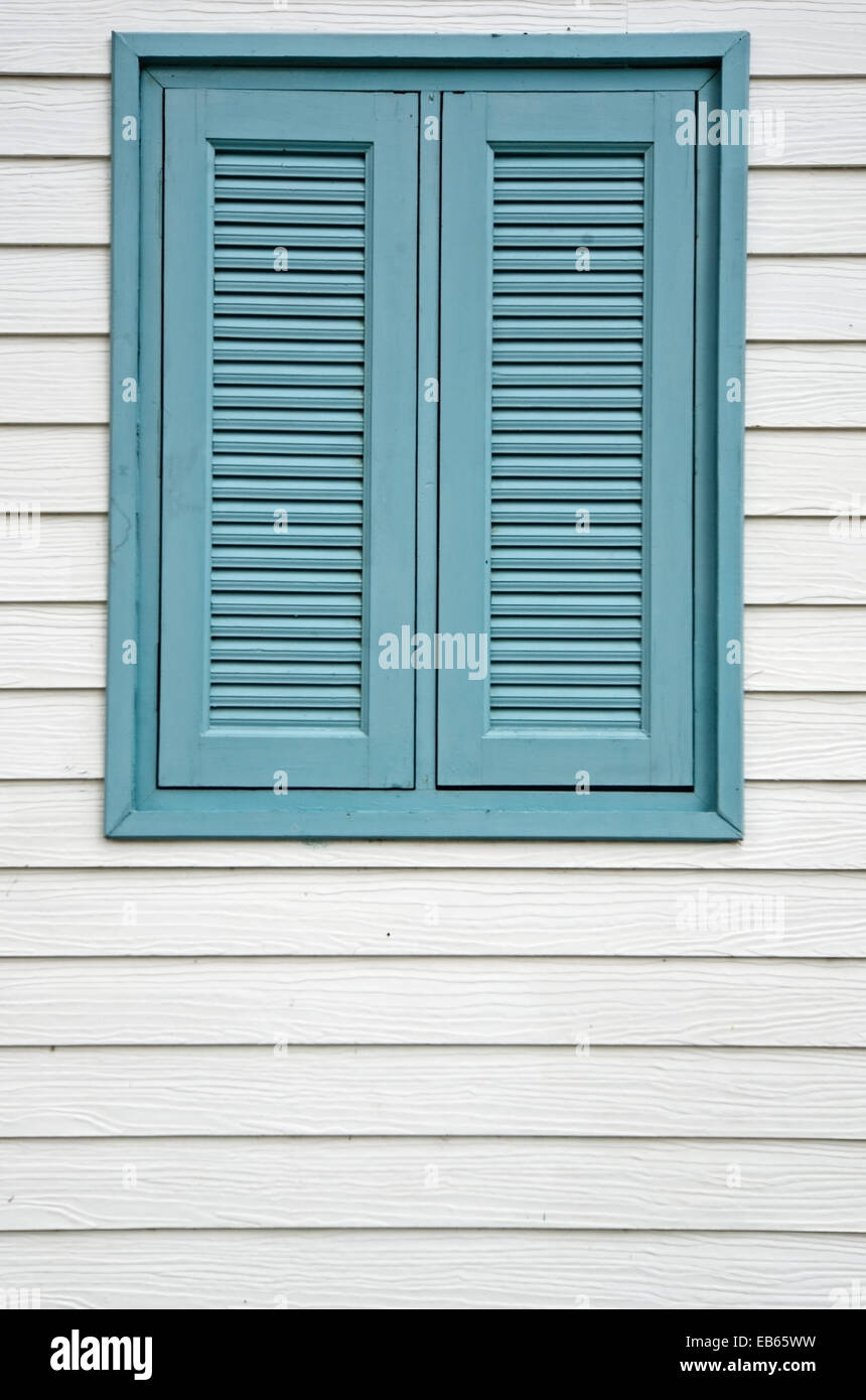 Beautiful cyan wooden window on a white wood background Stock Photo