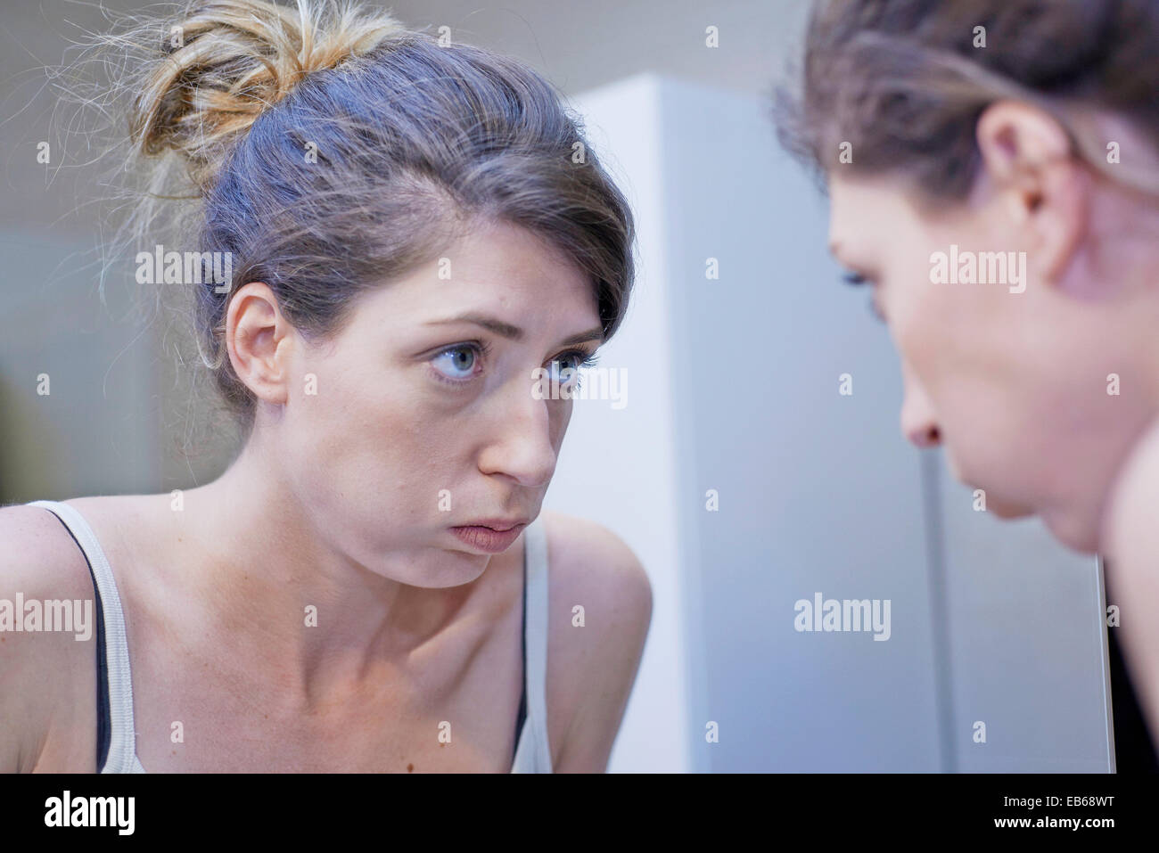 WOMAN WITH MIRROR Stock Photo