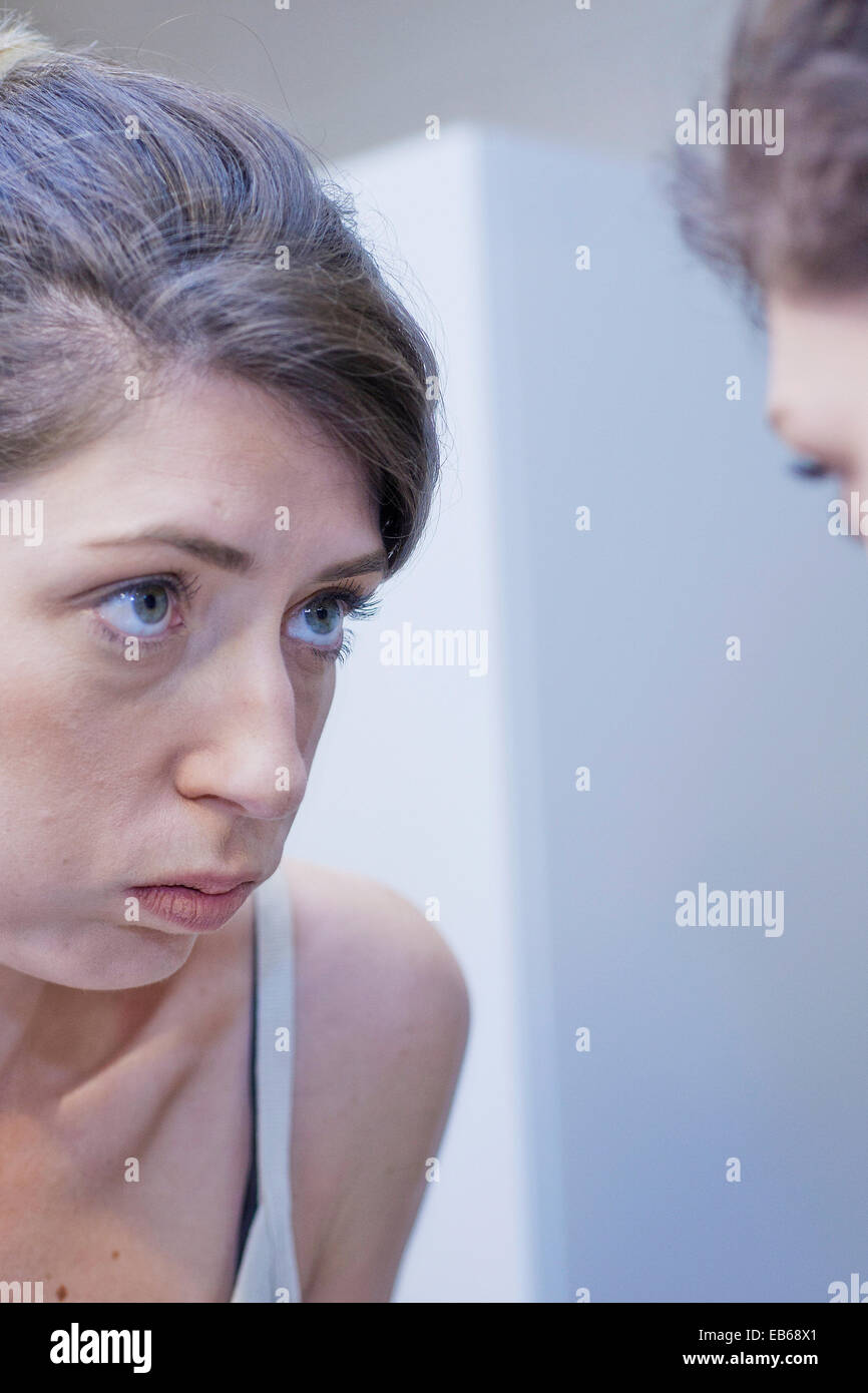 WOMAN WITH MIRROR Stock Photo