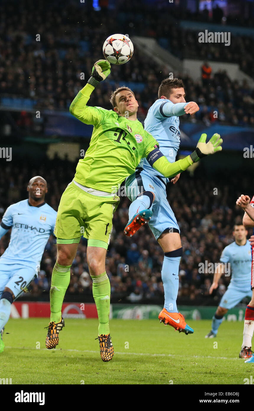 Nov. 25, 2014 - Manchester, United Kingdom - Manuel Neuer of Bayern Munich collects the ball under pressure from Stevan Jovetic of Manchester City - UEFA Champions League group E - Manchester City vs Bayern Munich - Etihad Stadium - Manchester - England - 25rd November 2014 - Picture Simon Bellis/Sportimage. Stock Photo