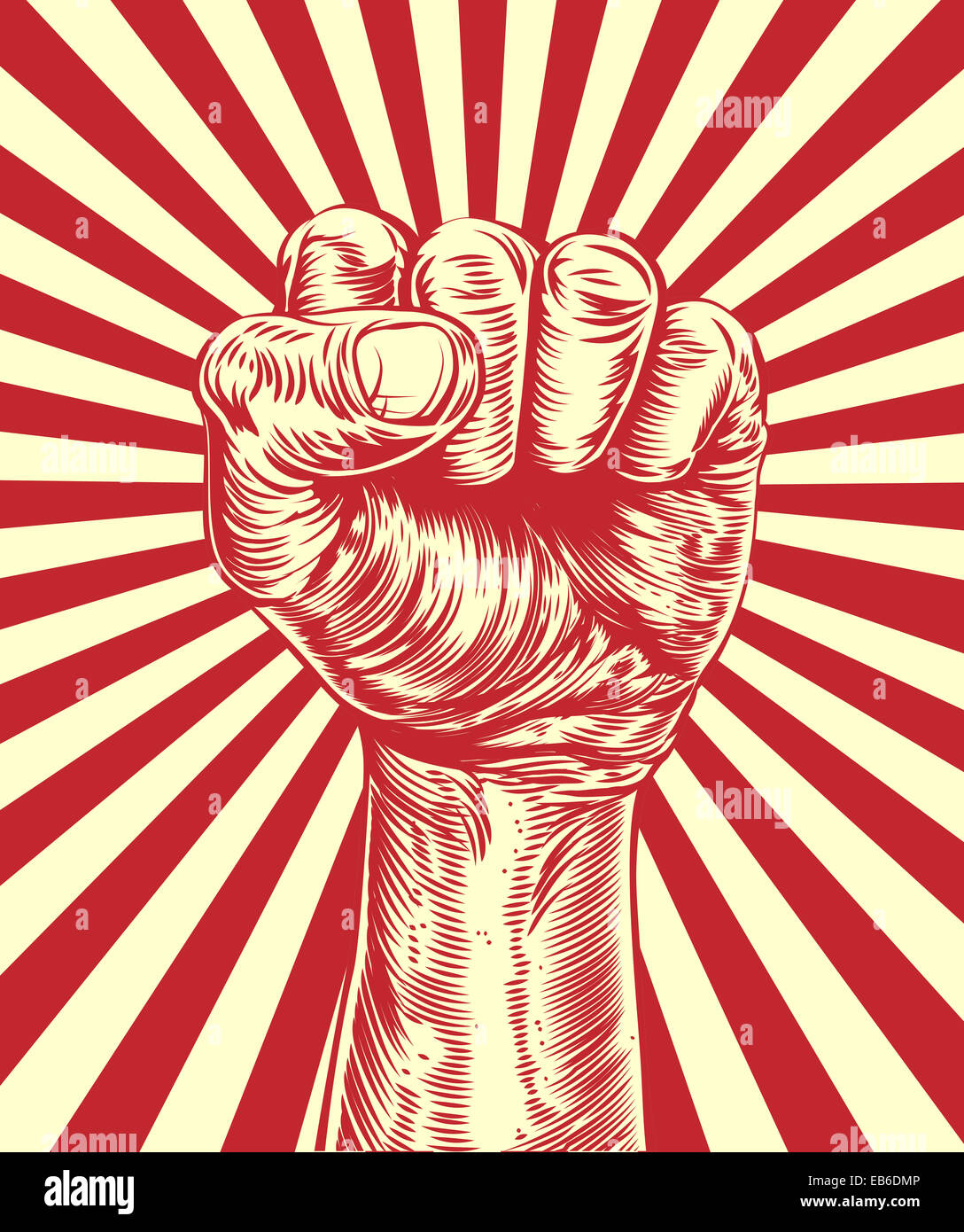 An original illustration of a revolutionary fist held in the air in a vintage wood cut propaganda style Stock Photo