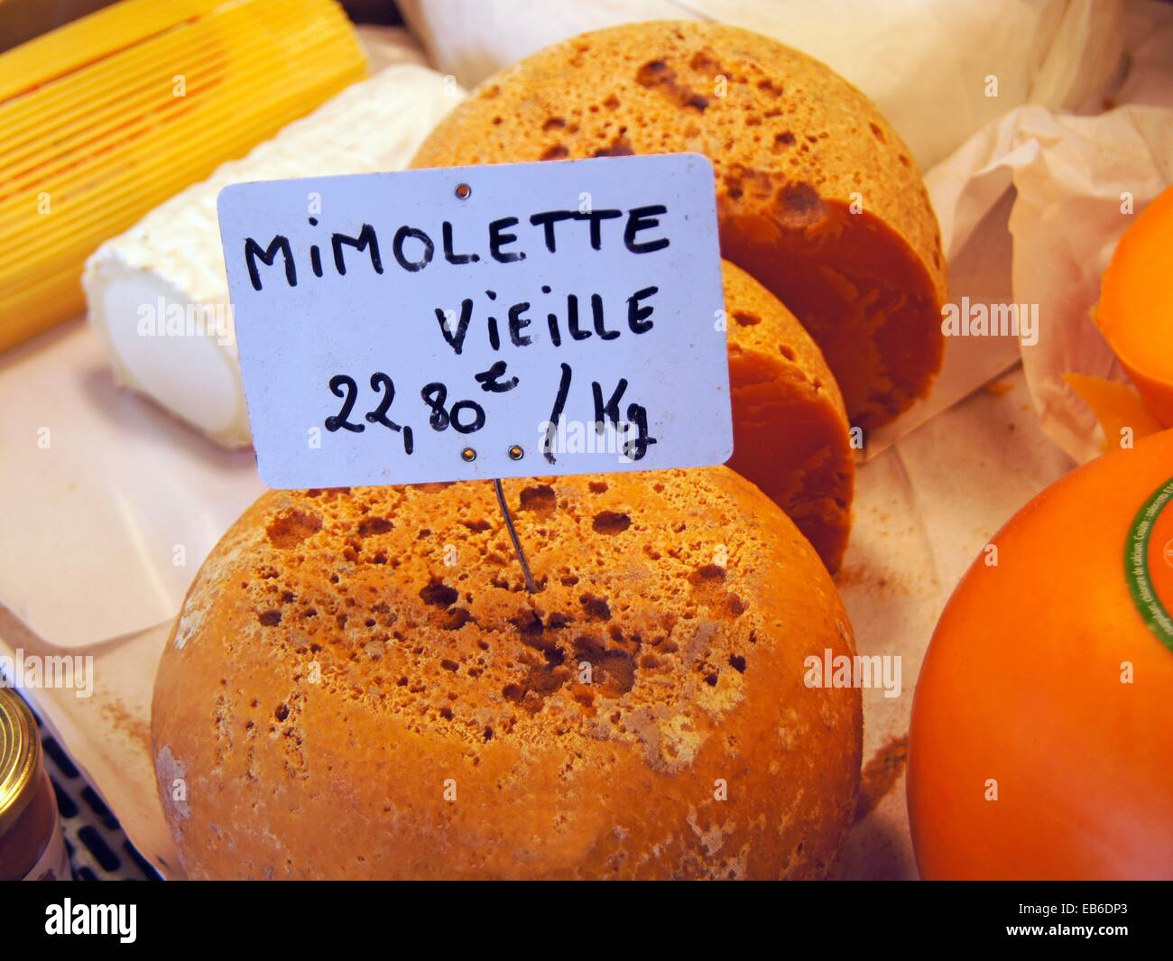 Mimolette is a cheese traditionally produced around the city of Lille France. In France it is also known as Boule de Lille Stock Photo