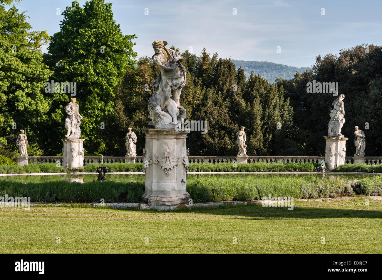 The romantic gardens of the early 18c Villa Trissino Marzotto, Vicenza, Italy. The pool in the lower garden, surrounded by statues by Orazio Marinali Stock Photo