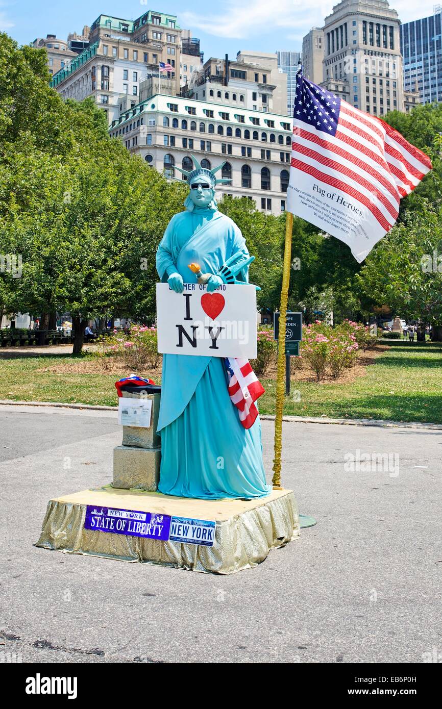 Mime mimics Statue of Liberty, Battery Park, Manhattan, New York City