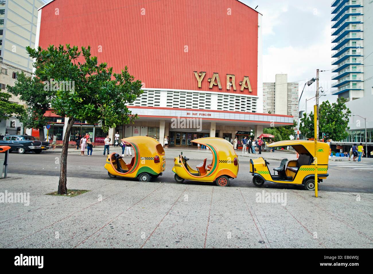 Yara Cinema, Coco taxis, Centro Havana district, La Havana, Cuba. Stock Photo