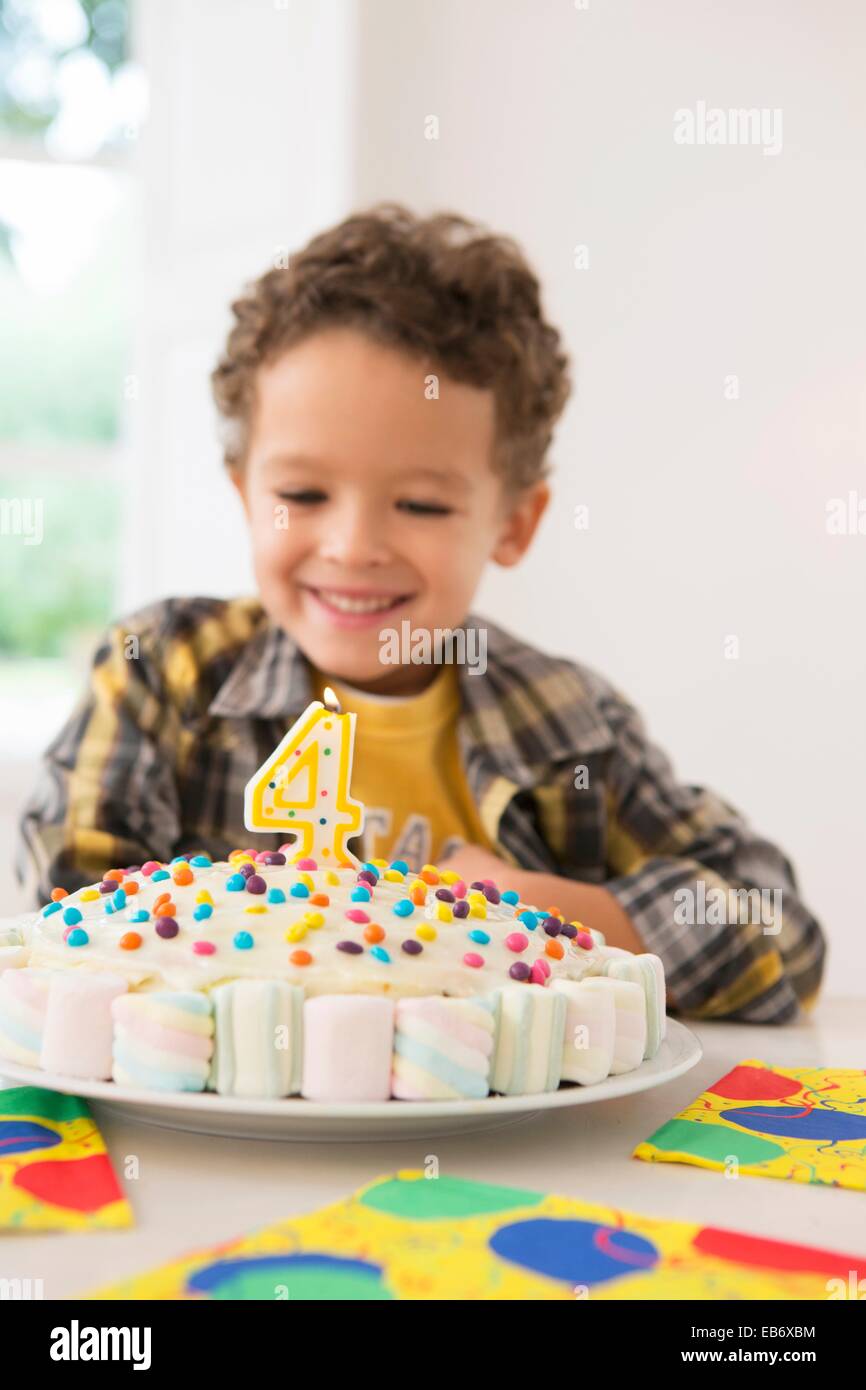 Four Year Old Boy Celebrating His Birthday Stock Photo Alamy