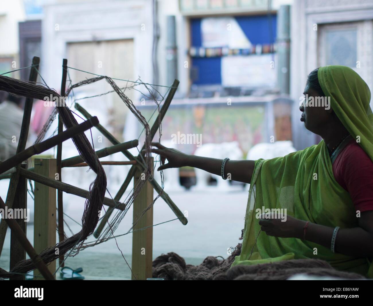 Woman using spinning wheel in Jaipur, Rajasthan, India Stock Photo Alamy