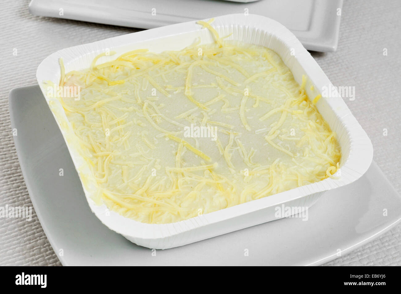 a tray with readymade lasagne ready to be baked Stock Photo